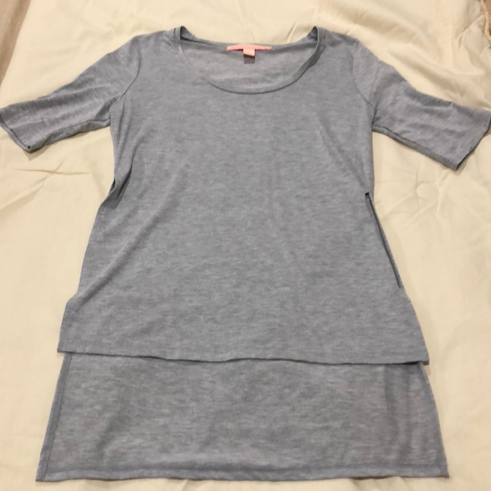 Grey top.